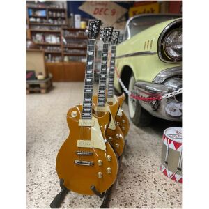 Golvstativ för tre gitarrer