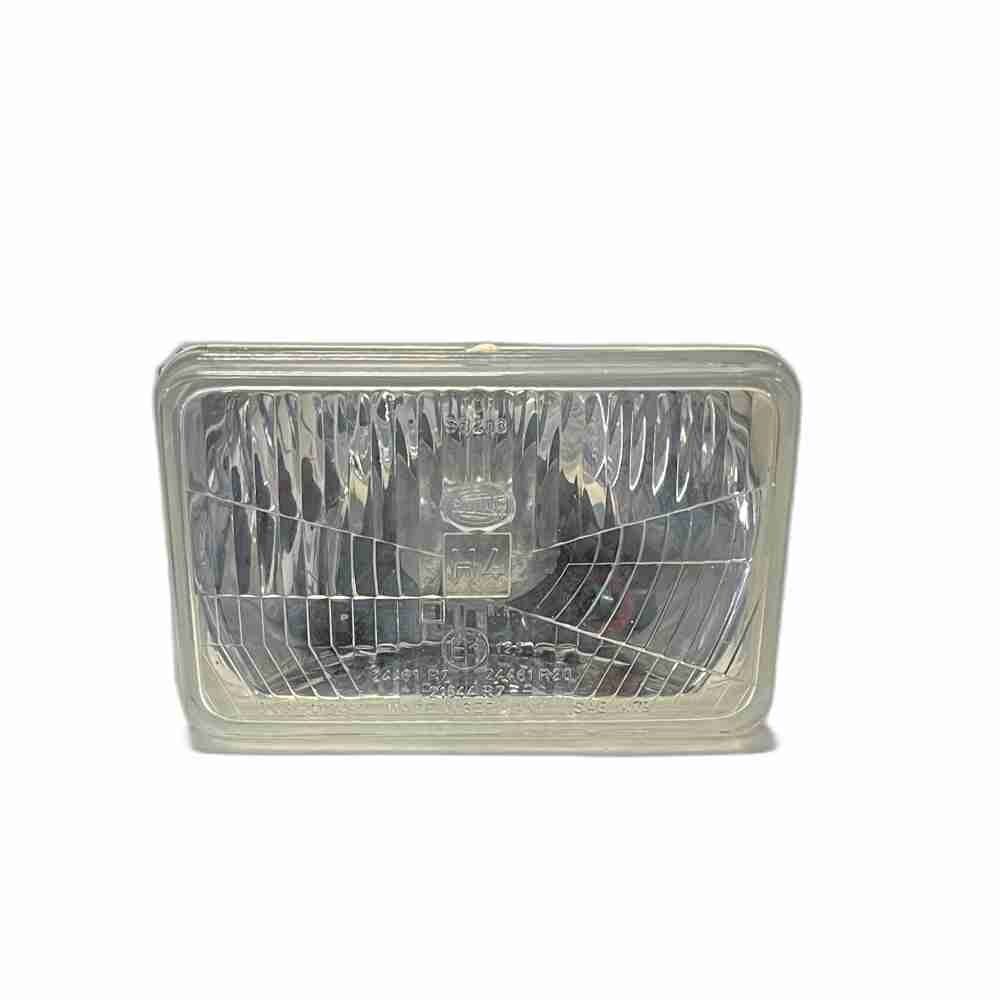 Strålkastare halogen H4 12/24V Hella 1AB 003177-071